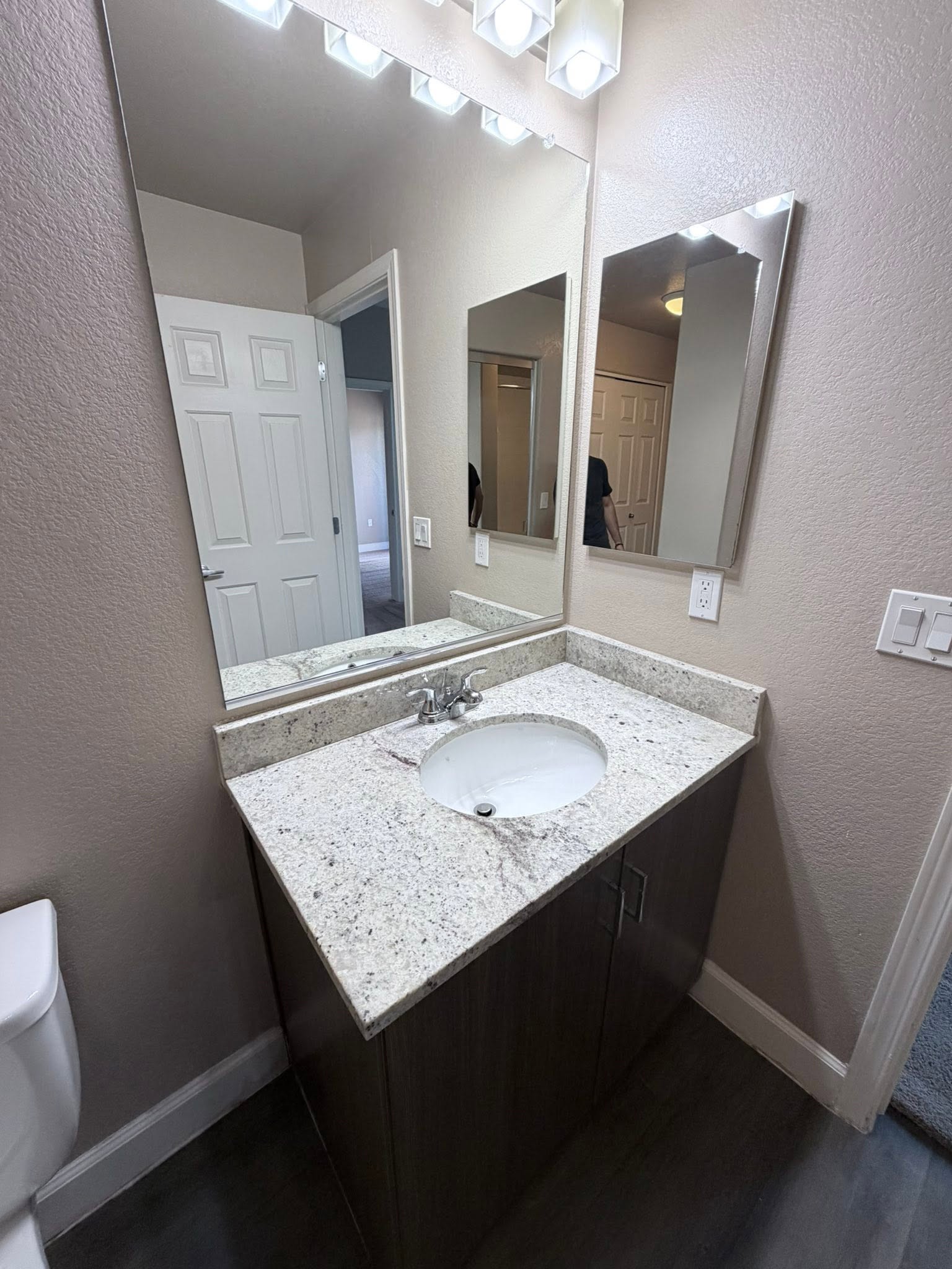 Clean bathroom vanity after Happy Home cleaning
